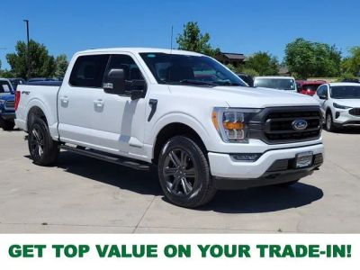 2023 Ford F-150 XLT in Oxford White — front three-quarter view