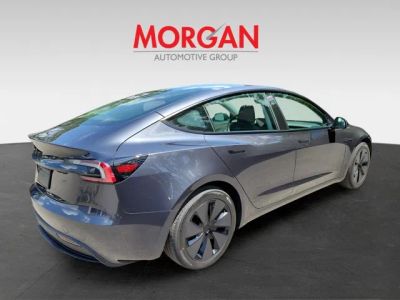 2025 Tesla Model 3 — side profile view