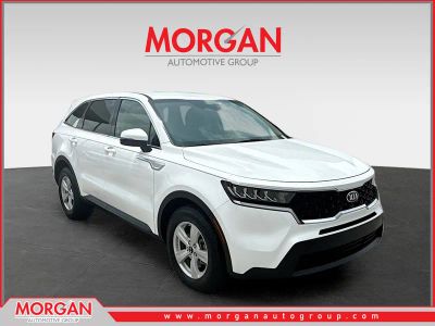 2021 Kia Sorento LX in Glacial White Pearl — front three-quarter view