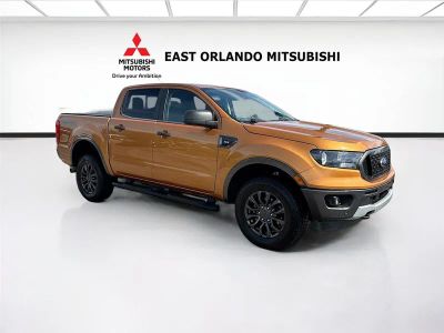 2019 Ford Ranger XLT in Saber Metallic — front three-quarter view