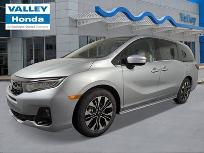 2026 Honda Odyssey Elite in Solar Silver Metallic — front three-quarter view