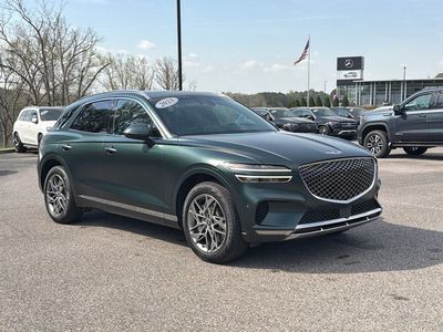 2023 Genesis GV70 2.5T in Brunswick Green — front three-quarter view