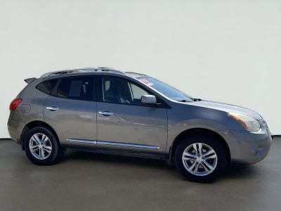 2012 Nissan Rogue SV in Platinum Graphite — front three-quarter view