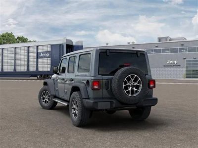 2026 Jeep Wrangler — rear three-quarter view