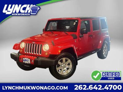 2017 Jeep Wrangler Sahara in Firecracker Red — front three-quarter view
