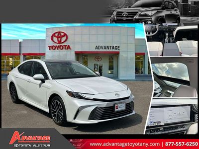 2026 Toyota Camry XLE in White — front three-quarter view