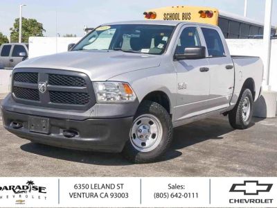 2018 RAM 1500 Tradesman in Bright Silver Met — front three-quarter view