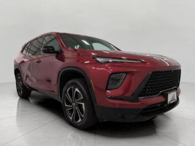 2026 Buick Enclave 4dr Sport Touring in Cherry Red Tintcoat — front three-quarter view