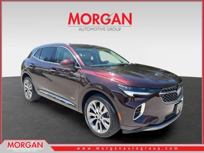 2023 Buick Envision Avenir in Rich Garnet Metallic — front three-quarter view