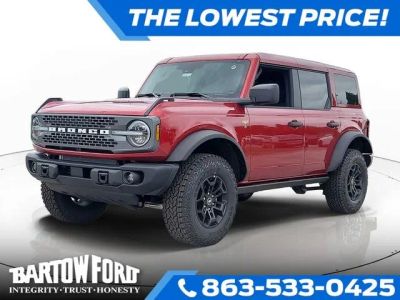 2026 Ford Bronco Badlands in Ruby Red Metallic — front three-quarter view