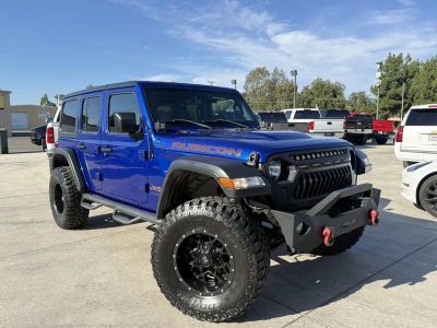 2018 Jeep Wrangler in Blue — front three-quarter view