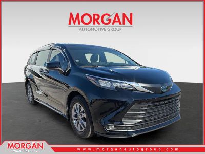 2025 Toyota Sienna XLE in Midnight Black Metallic — front three-quarter view