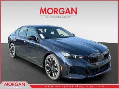 2027 BMW 5 Series 530i in Black — front three-quarter view