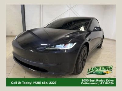 2025 Tesla Model 3 Long Range in Black — front three-quarter view