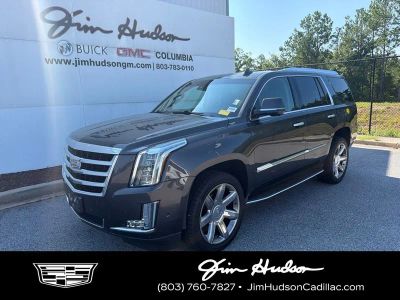 2017 Cadillac Escalade Luxury in Dark Granite — front three-quarter view