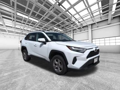 2023 Toyota RAV4 XLE in White — front three-quarter view