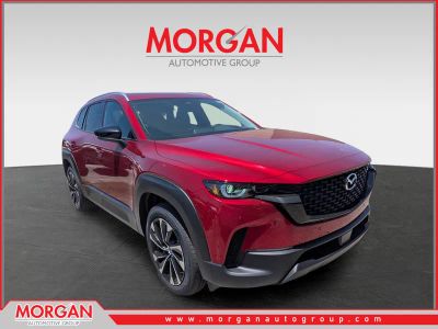 2026 Mazda CX-50 Hybrid Premium Plus in Soul Red Crystal Metallic — front three-quarter view