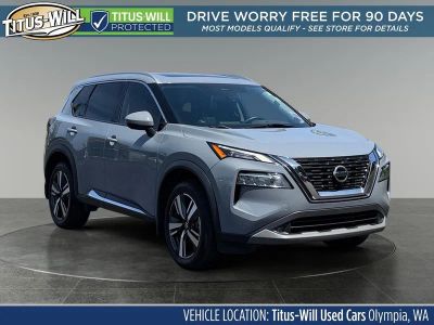 2021 Nissan Rogue SL in Boulder Gray Pearl — front three-quarter view