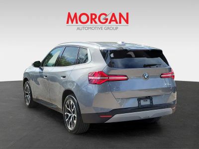 2026 BMW X3 — rear three-quarter view