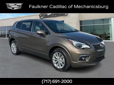 2017 Buick Envision Essence in Bronze Alloy Metallic — front three-quarter view