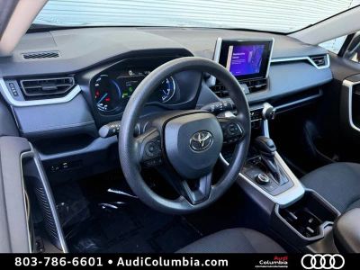 2025 Toyota RAV4 Hybrid — rear three-quarter view