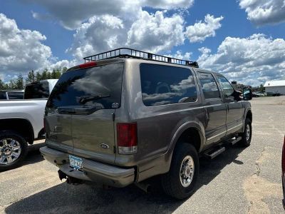 2005 Ford Excursion — rear three-quarter view