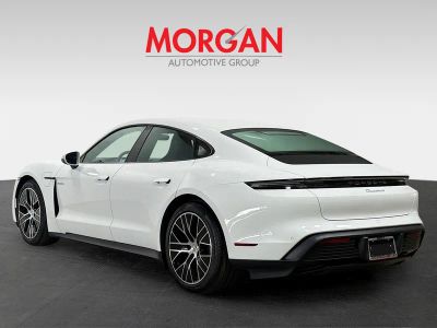 2025 Porsche Taycan — rear three-quarter view