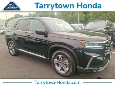 2023 Honda Pilot EX-L 7 Passenger in Crystal Black Pearl — front three-quarter view