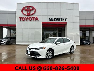 2020 Toyota Camry Hybrid 2559 — front three-quarter view