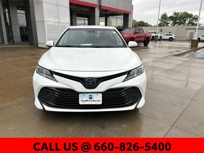 2020 Toyota Camry Hybrid — rear three-quarter view