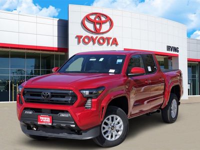 2026 Toyota Tacoma SR5 in Supersonic Red — front three-quarter view