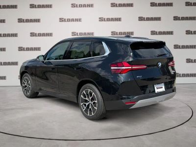 2026 BMW X3 — rear three-quarter view