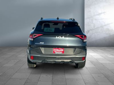 2023 Kia Sportage — rear three-quarter view