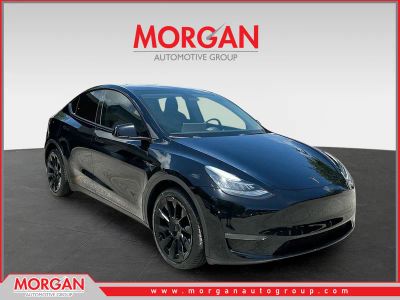 2022 Tesla Model Y Long Range in Black — front three-quarter view