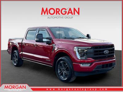 2023 Ford F-150 LARIAT in Red Metallic — front three-quarter view