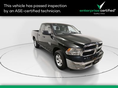 2024 Ram 1500 Classic SLT 4x4 Quad Cab 6'4" Box — front three-quarter view