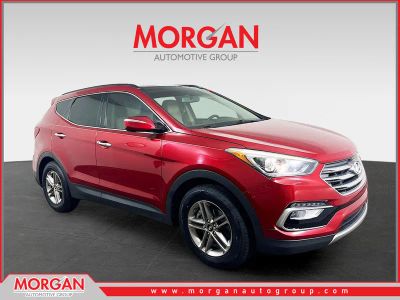 2017 Hyundai Santa Fe Sport 2.4 Base in Red — front three-quarter view