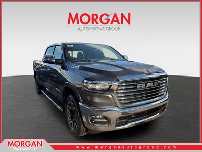 2026 Ram 1500 Laramie in Granite Crystal Metallic Clearcoat — front three-quarter view