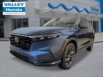2026 Honda CR-V EX-L in Canyon River Blue Metallic — front three-quarter view