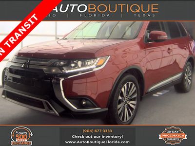 2020 Mitsubishi Outlander SEL in Red — front three-quarter view