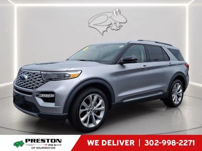 2021 Ford Explorer Platinum in Iconic Silver — front three-quarter view