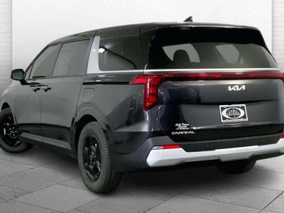 2026 Kia Carnival — rear three-quarter view