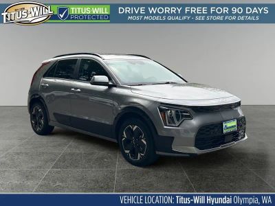 2023 Kia Niro EV Wind in Steel Gray — front three-quarter view