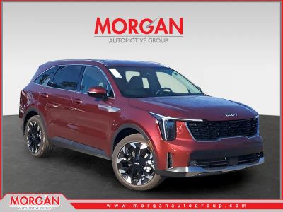 2025 Kia Sorento EX in Red — front three-quarter view
