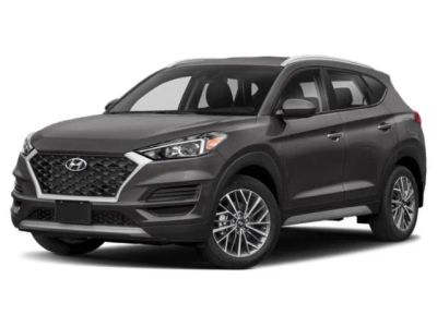 2019 Hyundai Tucson SEL in Dazzling White — front three-quarter view