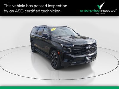 2024 Chevrolet Suburban 4WD 4dr RST — front three-quarter view