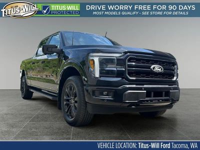 2025 Ford F-150 Lariat in Black — front three-quarter view