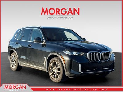 2026 BMW X5 xDrive40i in Black — front three-quarter view