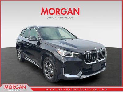 2025 BMW X1 xDrive28i in Black — front three-quarter view