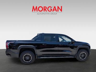 2026 Chevrolet Silverado EV — rear three-quarter view